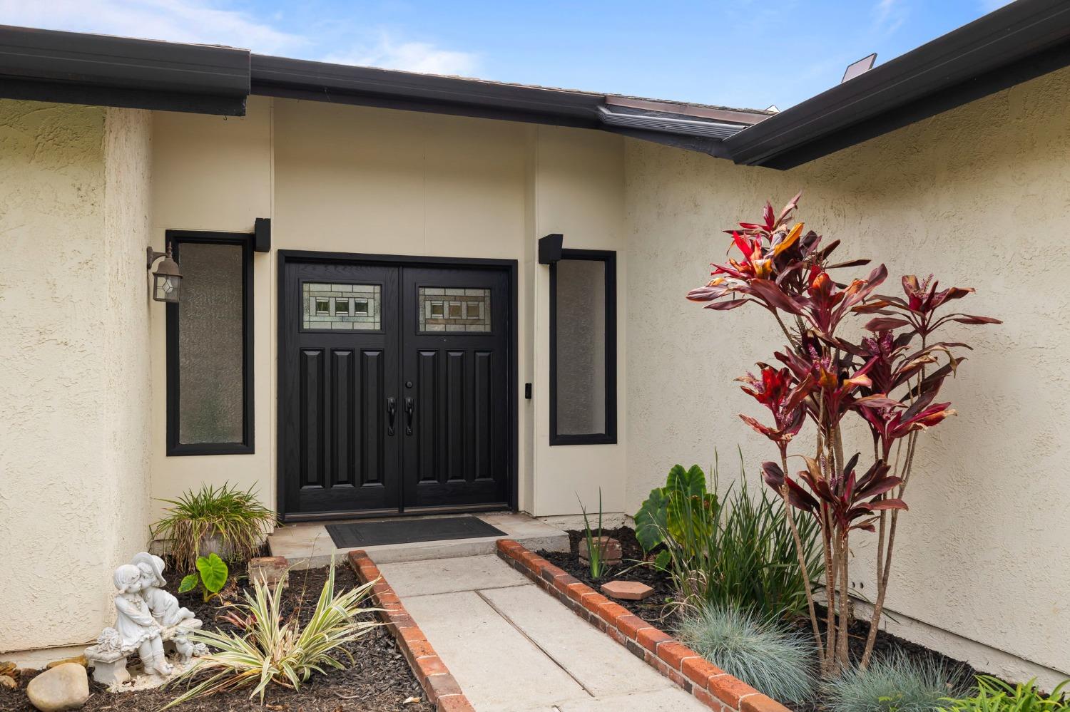 150 North Donna Street Oak View, CA 93022 - Photo 6 of 47 a potted plant sitting in front of a door