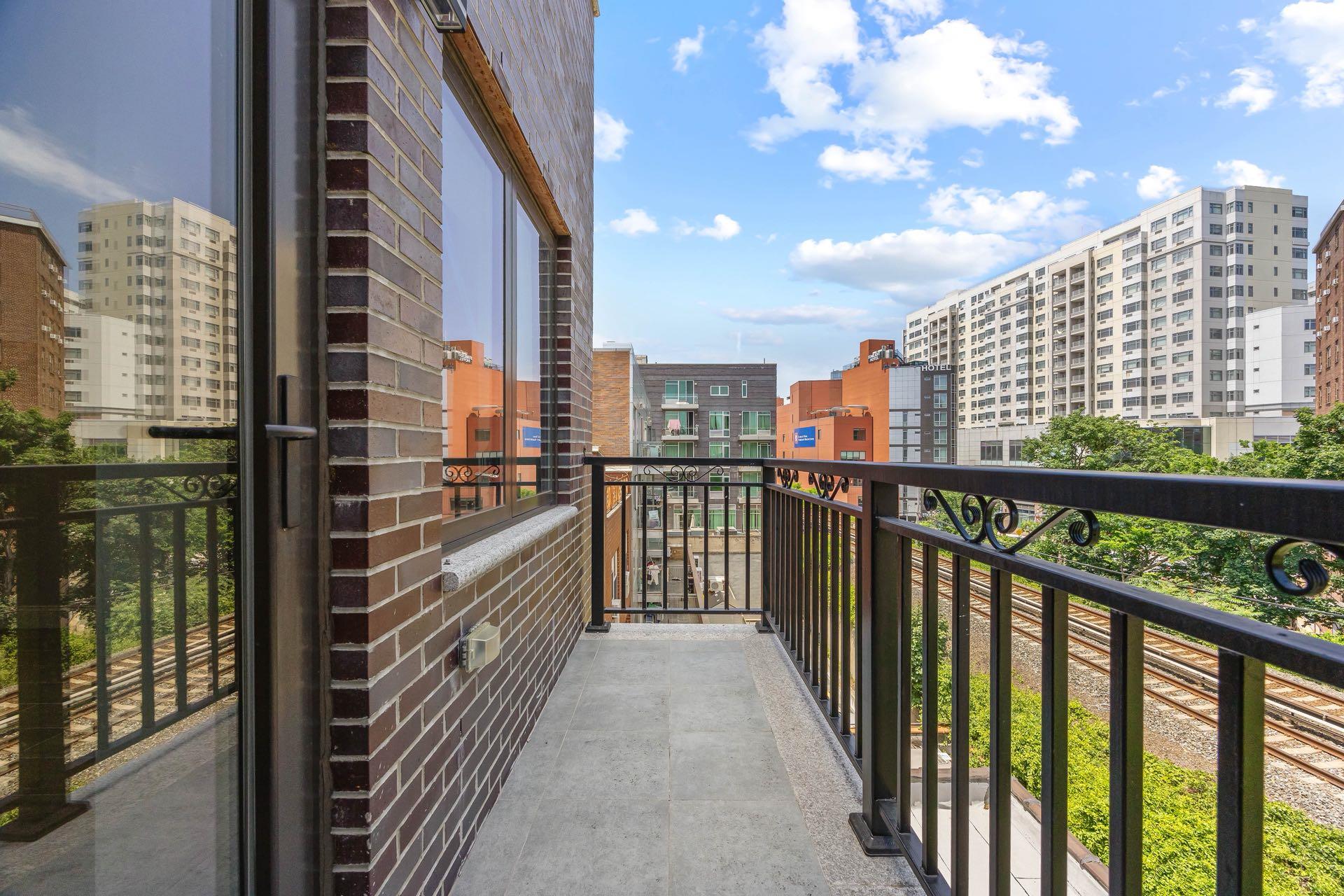 132-25 41st Avenue, Unit 3B Queens, NY 11355 - Photo 4 of 11 a view of balcony with city view
