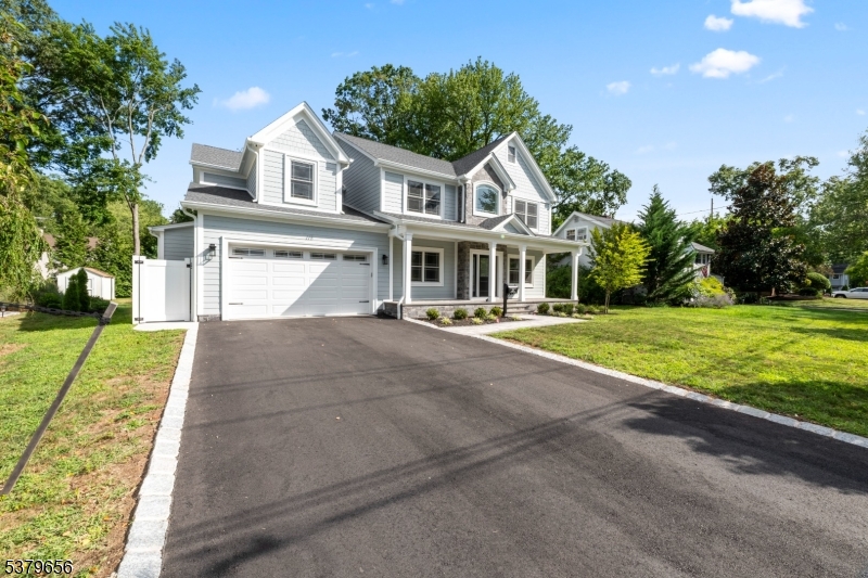 118 Cambridge Road Westfield, NJ 07090 - Photo 2 of 50 a view of house with yard and green space