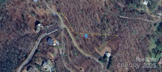 a view of entryway with wooden fence