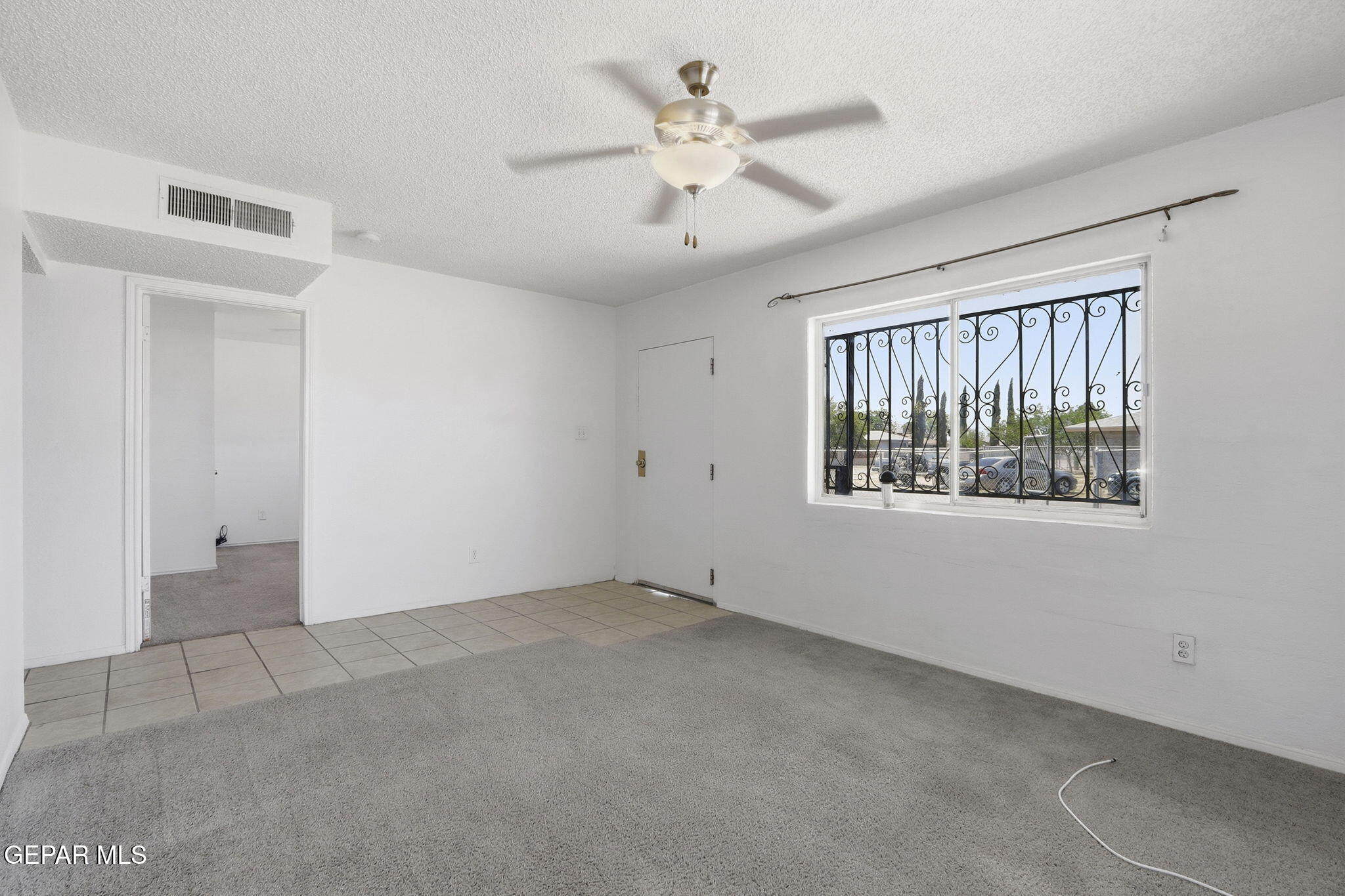 496 Telop Road El Paso, TX 79927 - Photo 2 of 12 a view of an empty room with a window