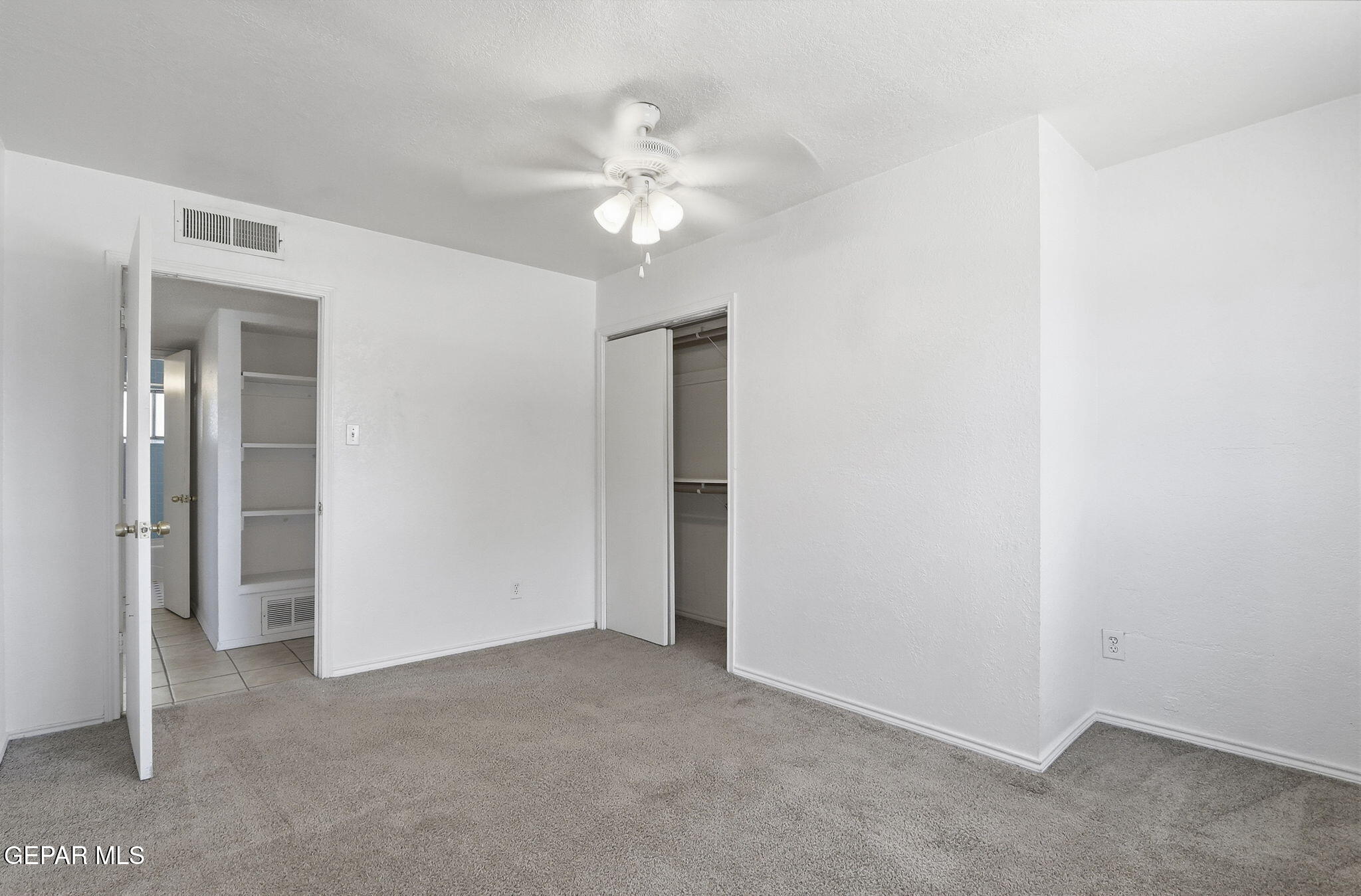 496 Telop Road El Paso, TX 79927 - Photo 7 of 12 a view of a chandelier in big room and chandelier fan