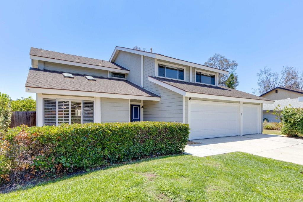 4595 Blackwell Road Oceanside, CA 92056 - Photo 2 of 47 a front view of a house with a yard
