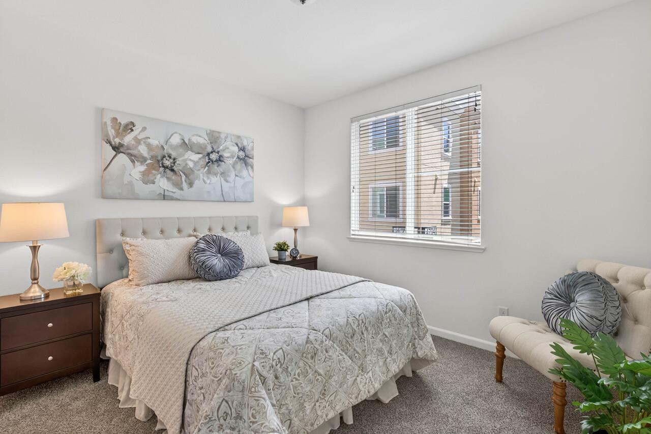 4712 Norris Canyon Road, Unit 104 San Ramon, CA 94583 - Photo 10 of 22 a bedroom with bed and window