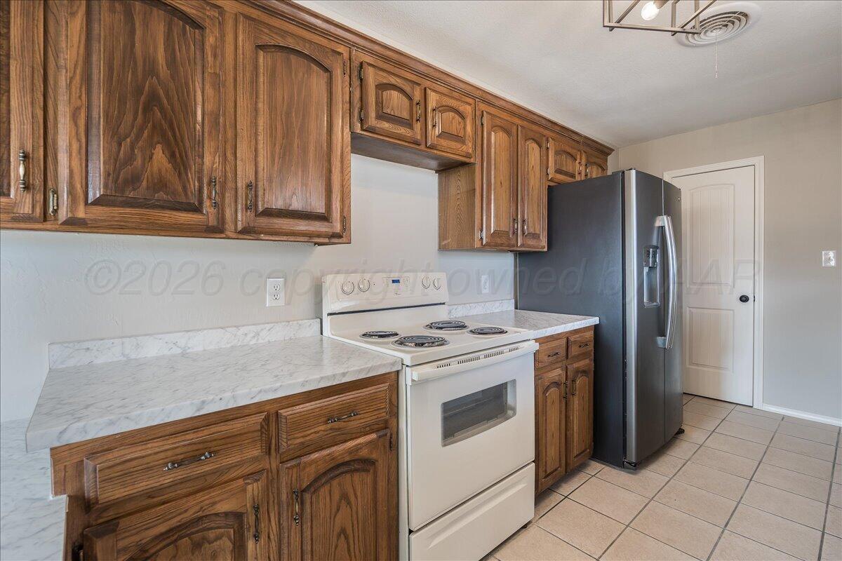 122 Racine Trail Amarillo, TX 79108 - Photo 7 of 17 06-Kitchen 2