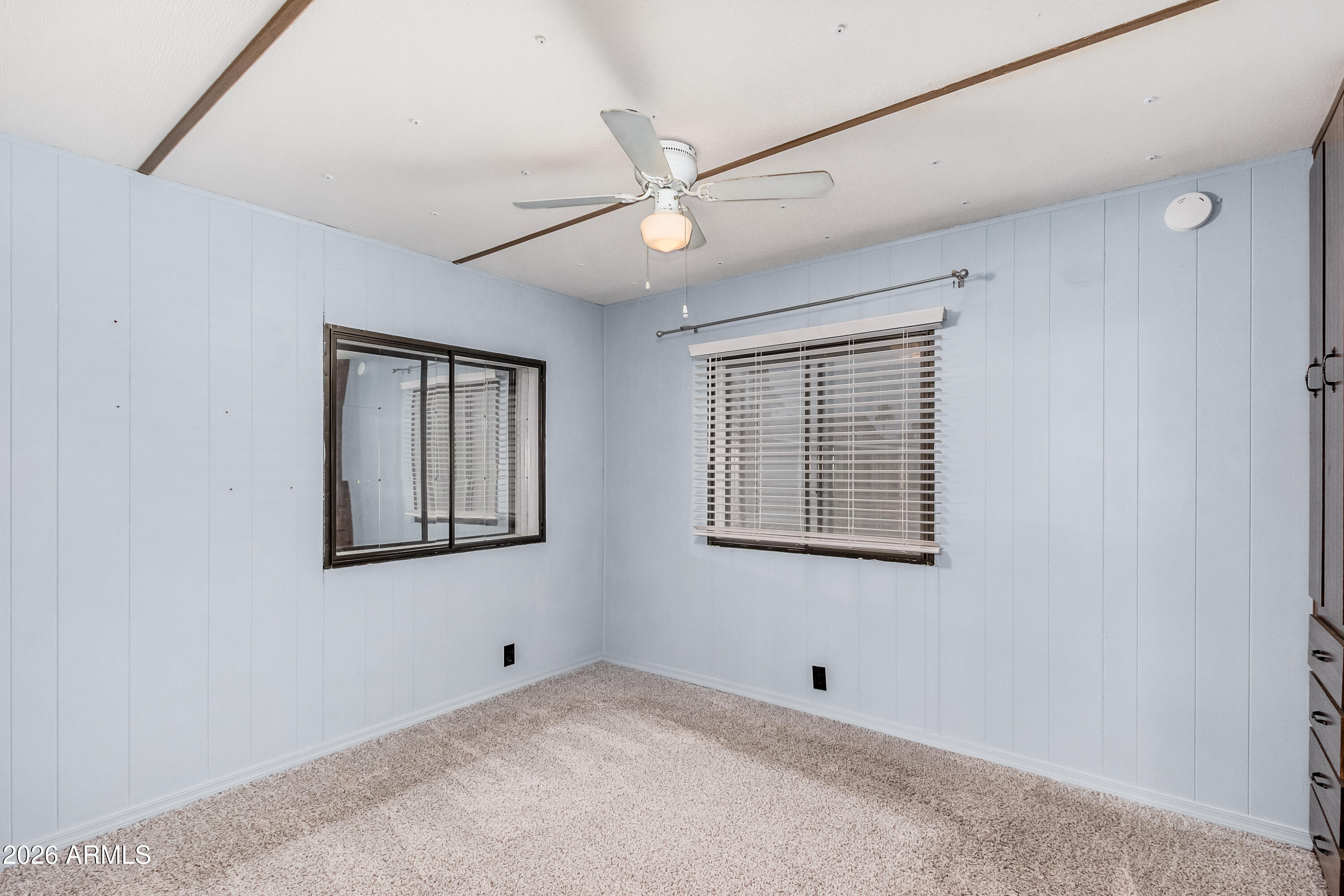 9302 East Broadway Road, Unit 122 Mesa, AZ 85208 - Photo 15 of 30 a view of an empty room with a window