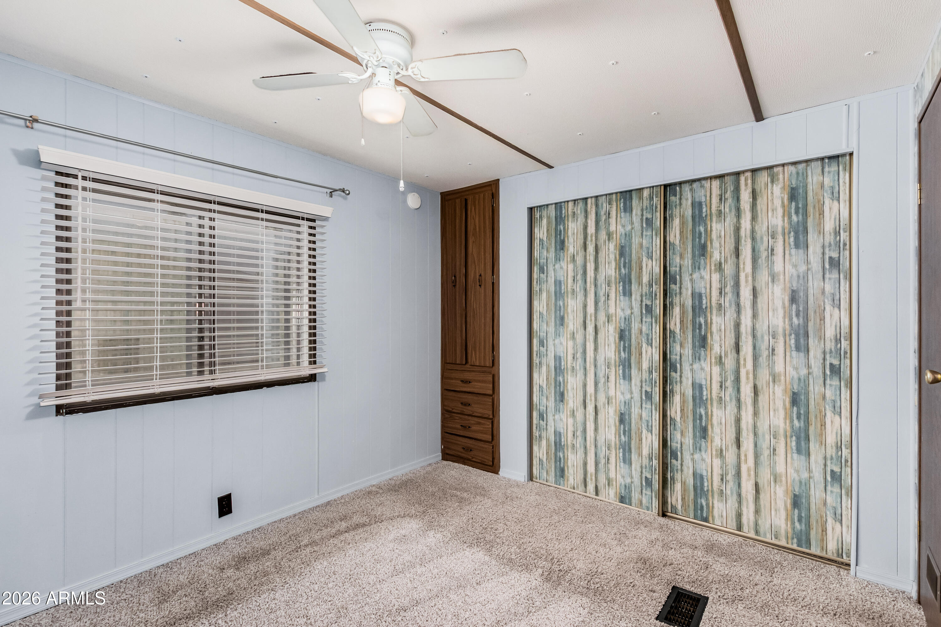 9302 East Broadway Road, Unit 122 Mesa, AZ 85208 - Photo 16 of 30 a view of a room with a large window and stairs