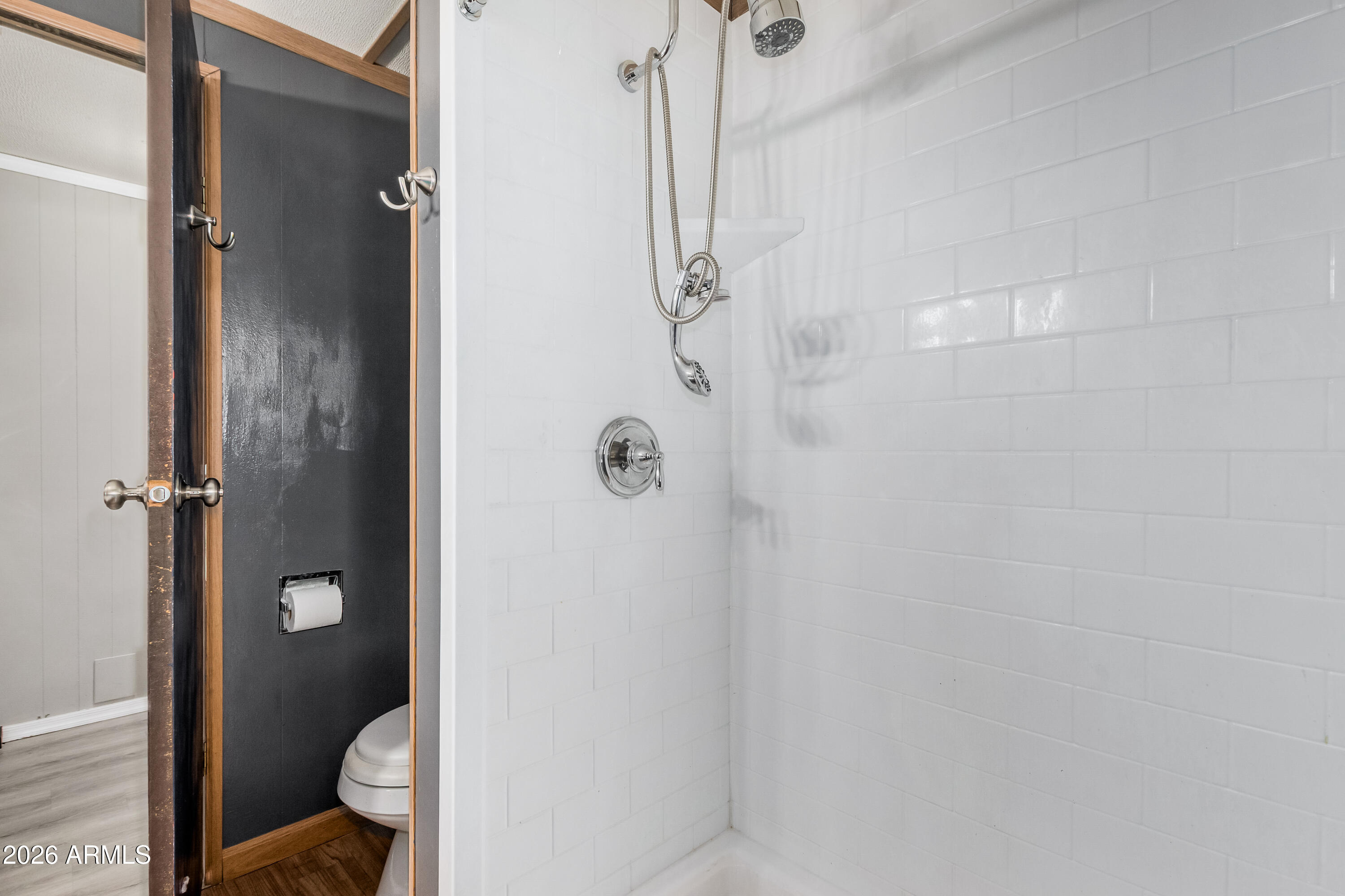 9302 East Broadway Road, Unit 122 Mesa, AZ 85208 - Photo 21 of 30 a bathroom with a granite countertop shower
