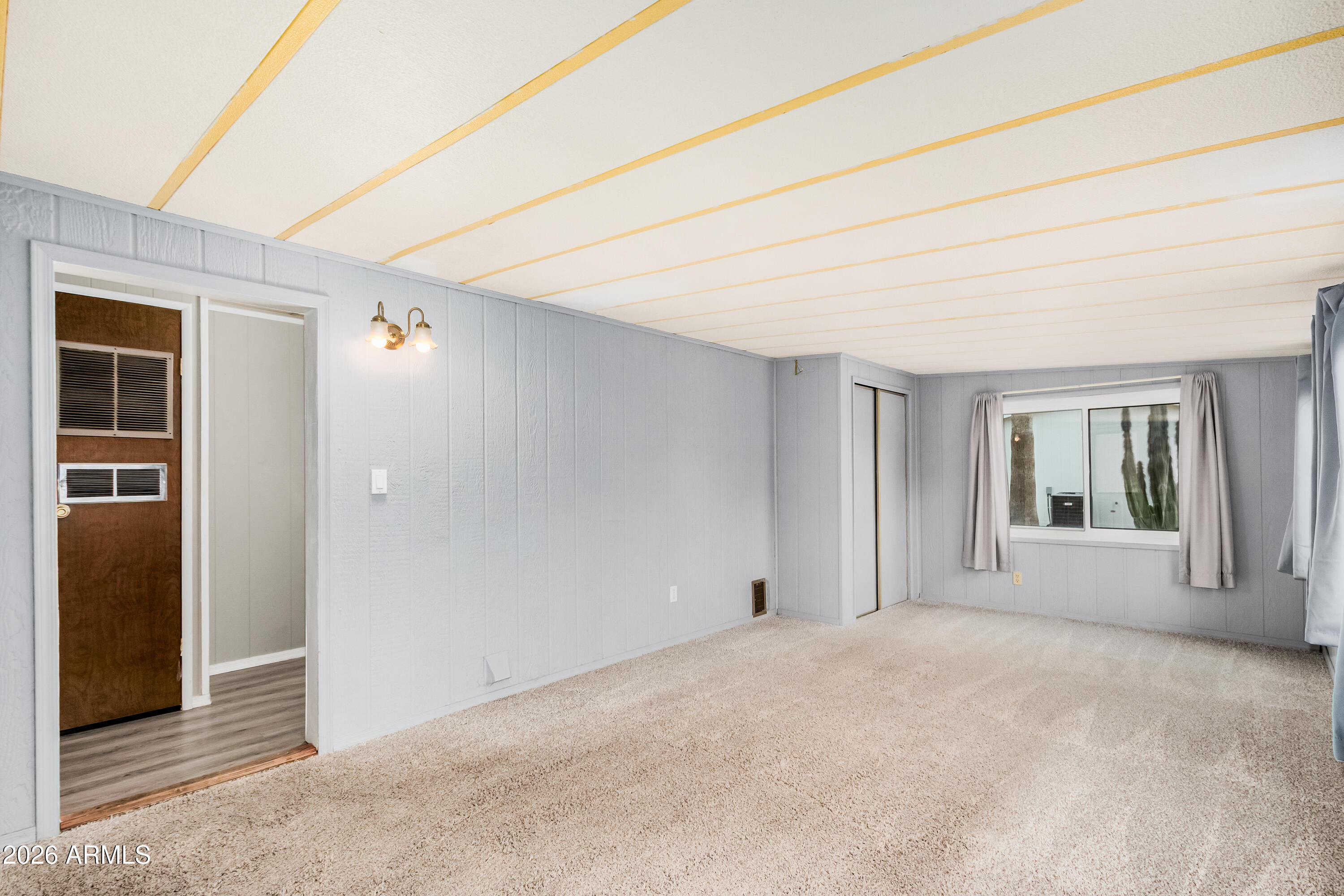 9302 East Broadway Road, Unit 122 Mesa, AZ 85208 - Photo 22 of 30 an empty room with windows