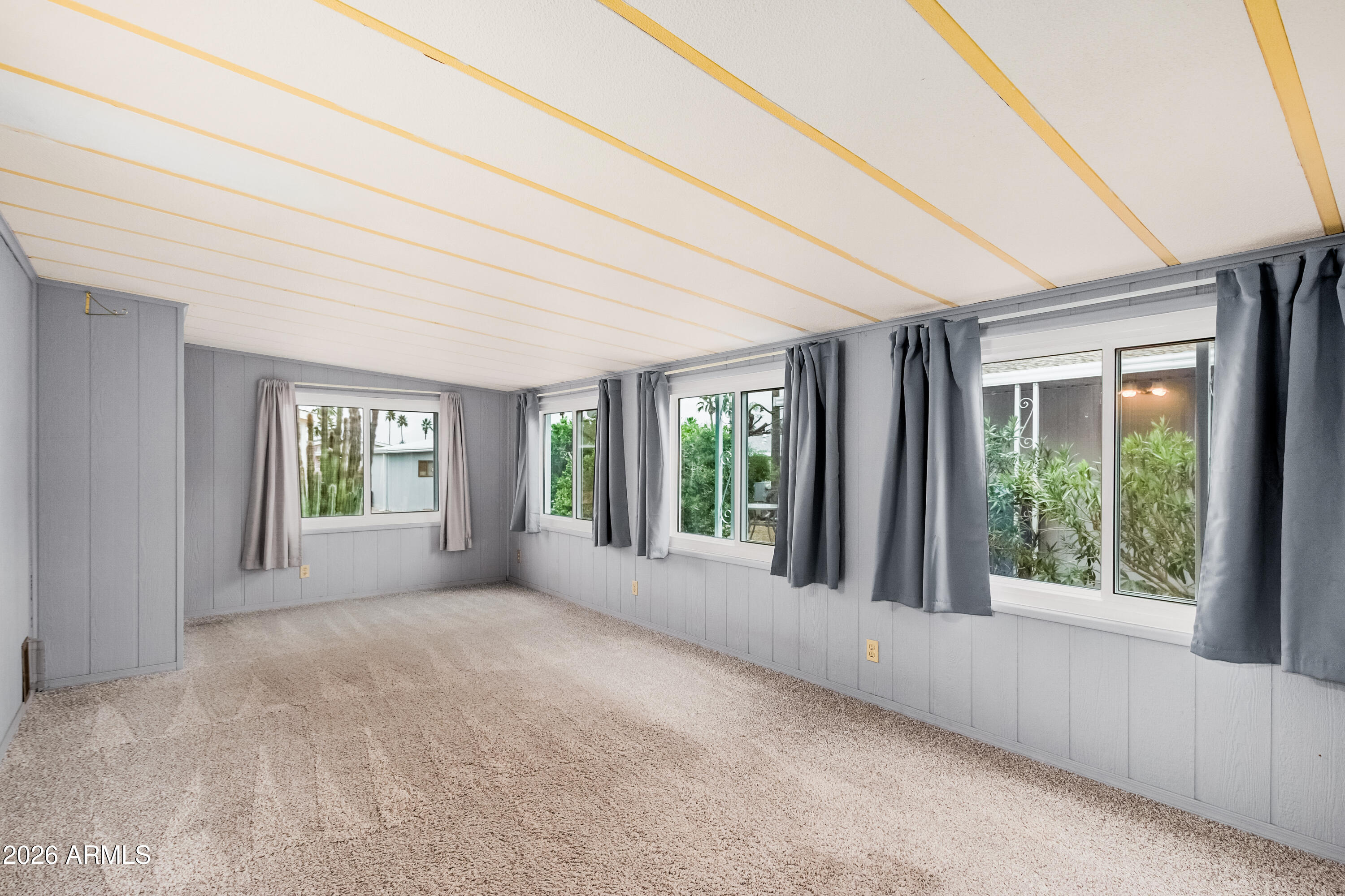 9302 East Broadway Road, Unit 122 Mesa, AZ 85208 - Photo 24 of 30 a view of an empty room with a window