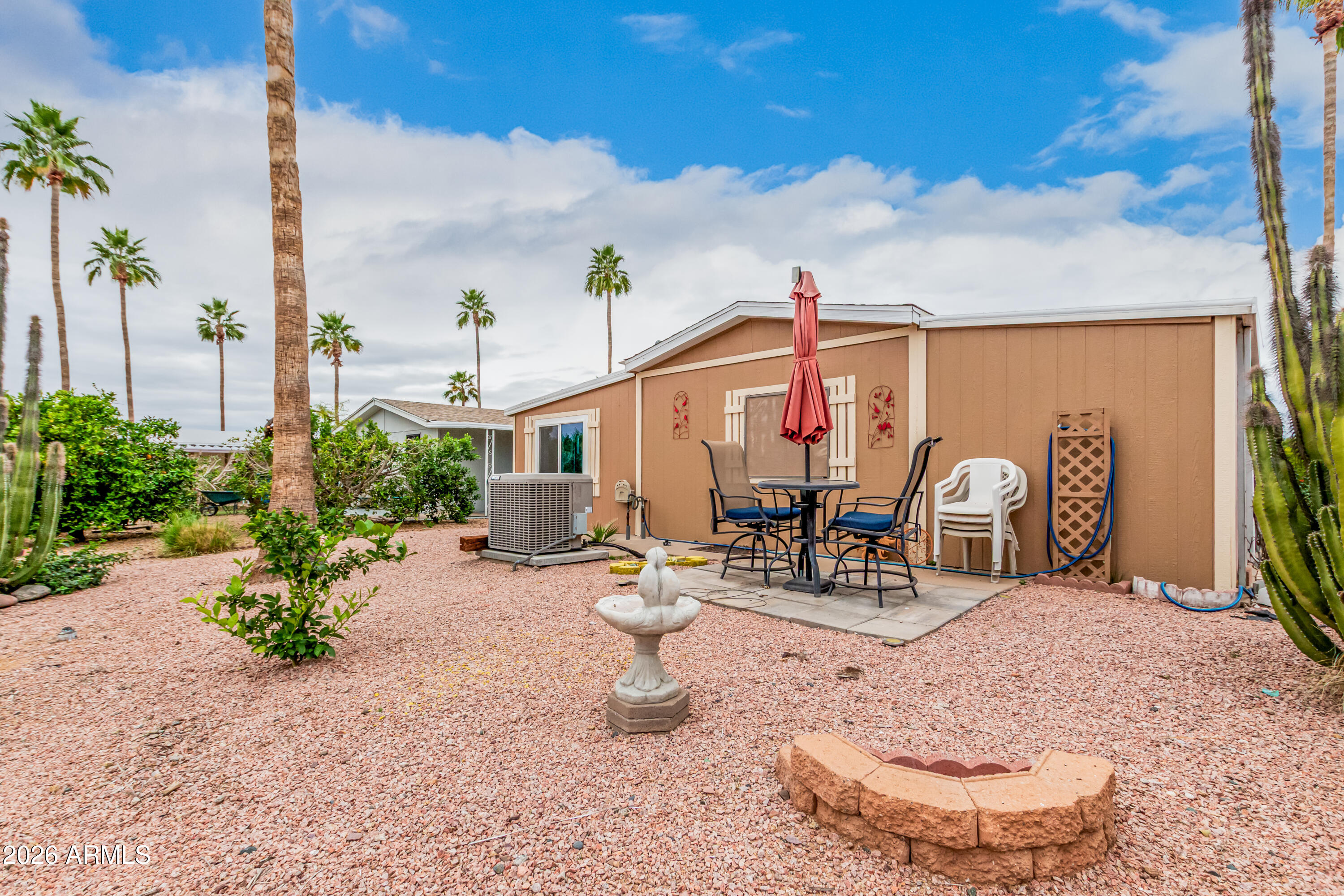9302 East Broadway Road, Unit 122 Mesa, AZ 85208 - Photo 29 of 30 a view of a terrace with sitting area