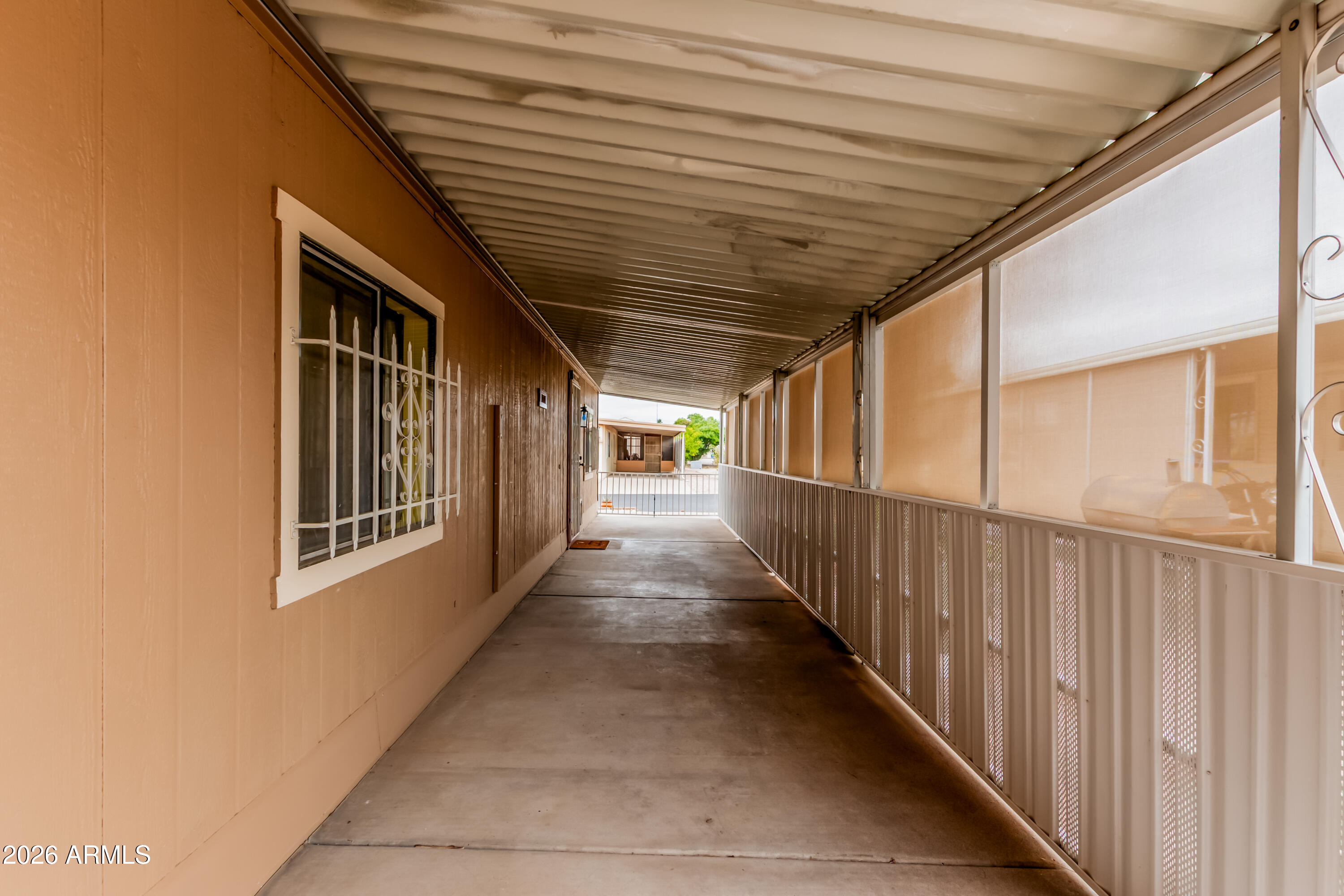 9302 East Broadway Road, Unit 122 Mesa, AZ 85208 - Photo 5 of 30 a view of a porch