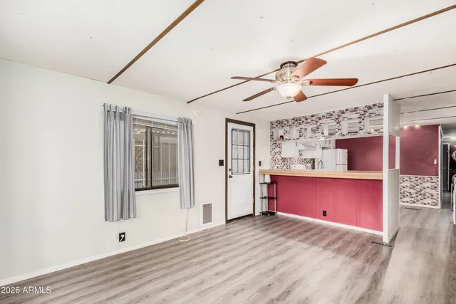 a view of a living room with furniture