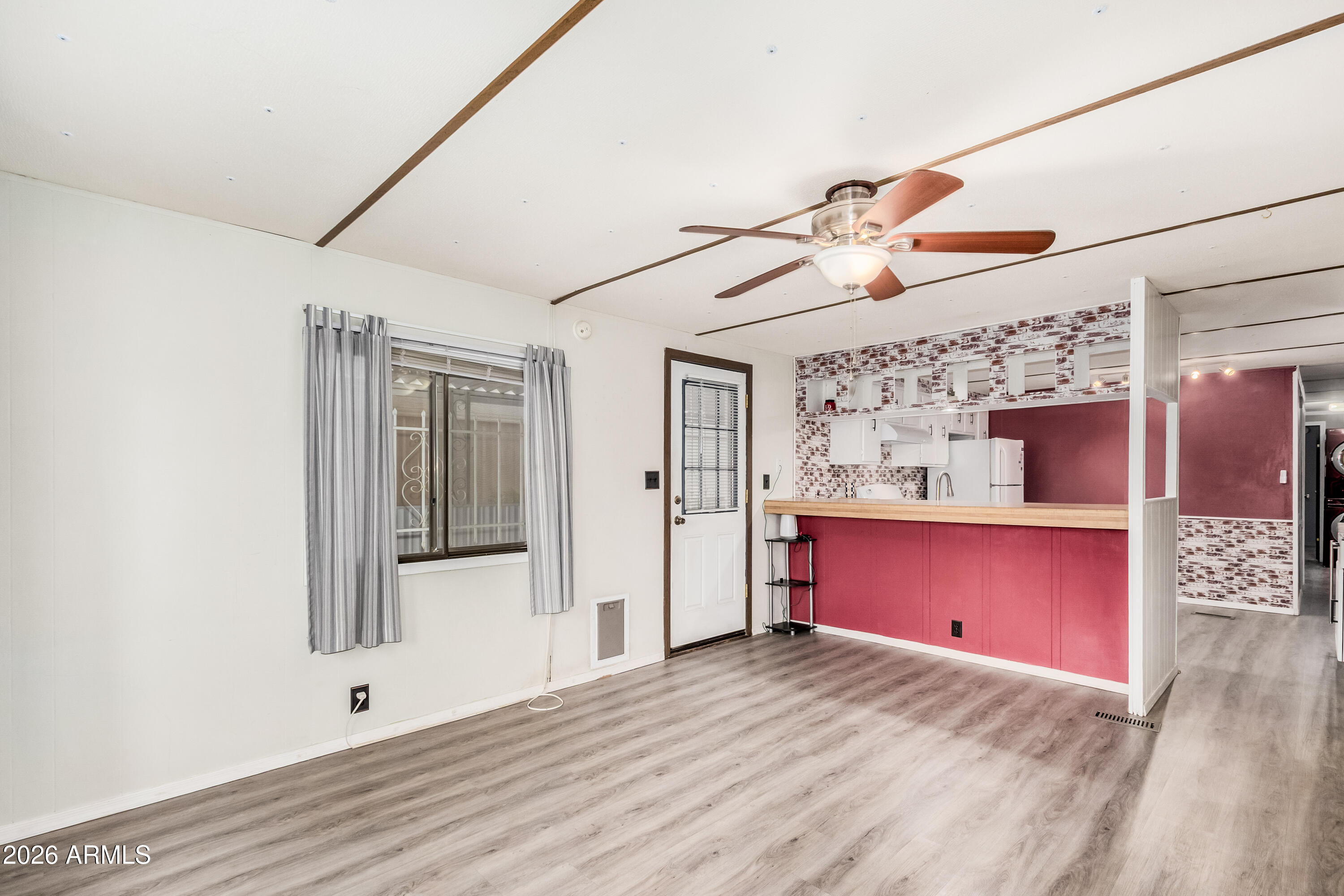 9302 East Broadway Road, Unit 122 Mesa, AZ 85208 - Photo 9 of 30 a view of a living room with furniture