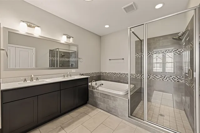 a view of a livingroom with wooden floor and a ceiling fan