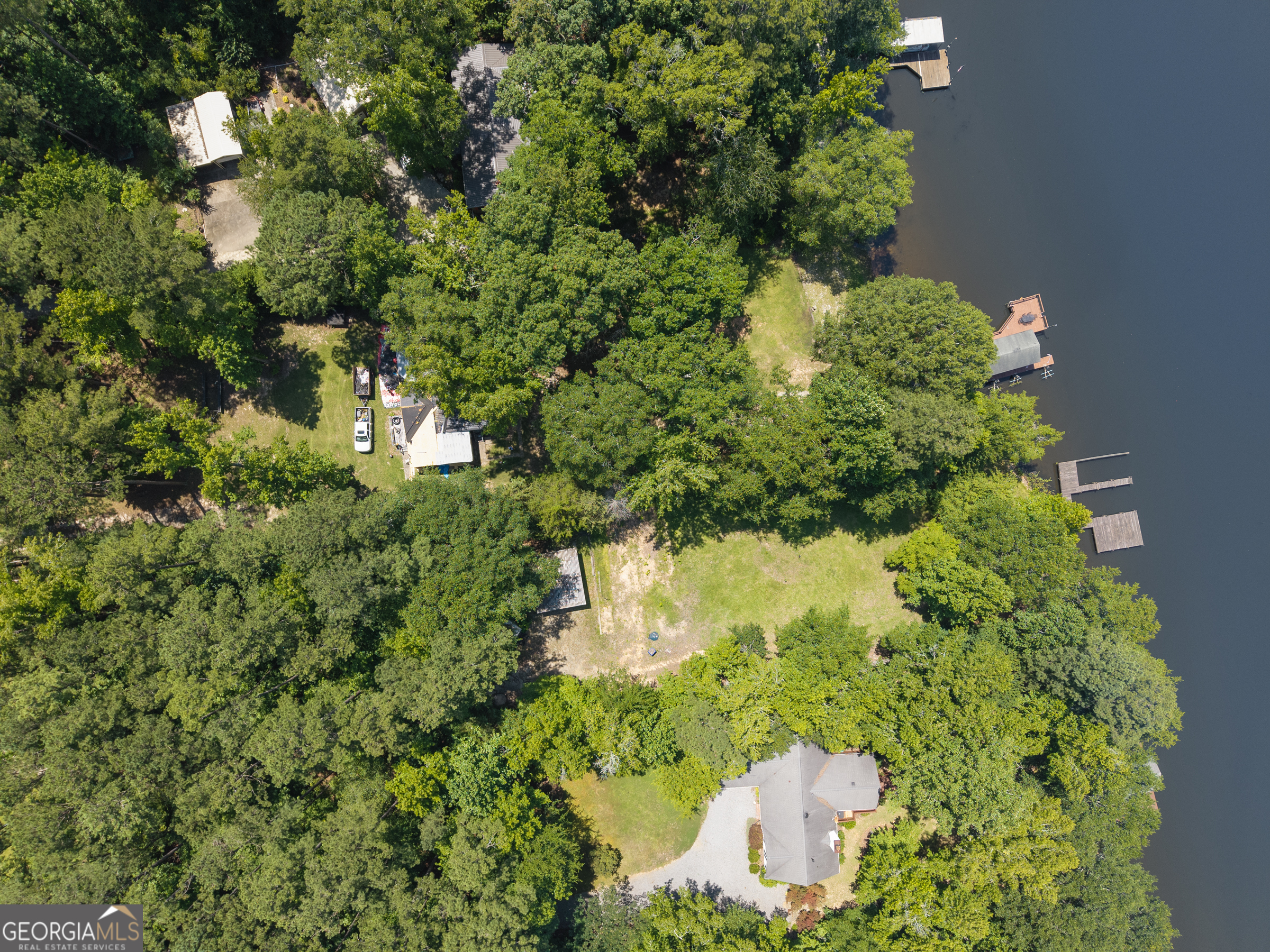 909 South Steel Bridge Road Eatonton, GA 31024 - Photo 17 of 18 a view of a garden with plants