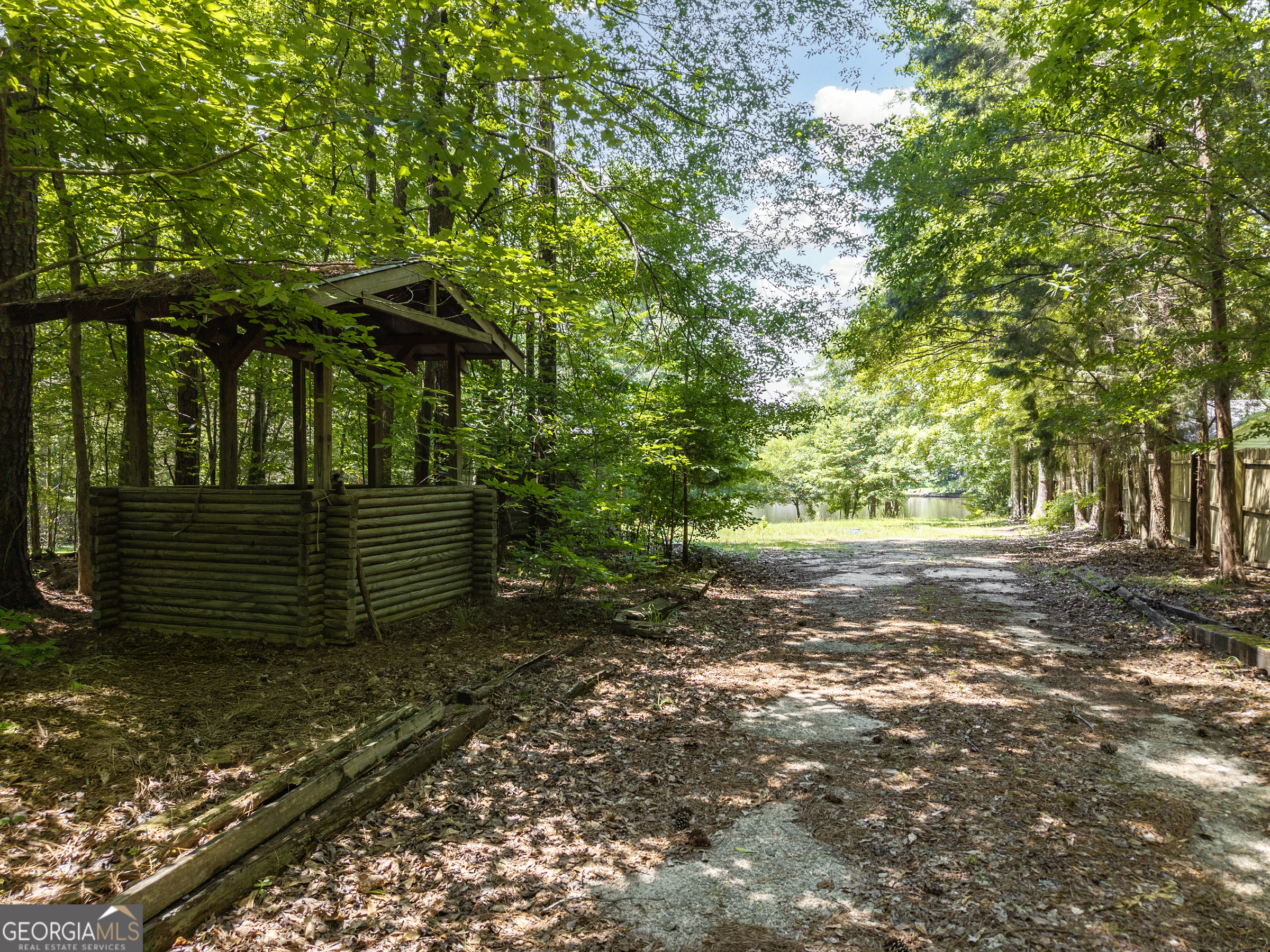 909 South Steel Bridge Road Eatonton, GA 31024 - Photo 6 of 18 a view of backyard with green space