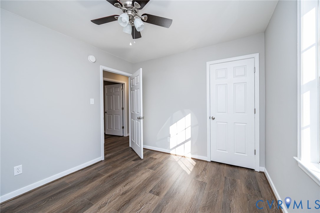 16702 South Crater Road Petersburg, VA 23805 - Photo 22 of 29 wooden floor in an empty room with a window