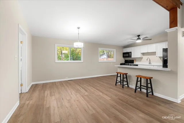a view of kitchen with breakfast area