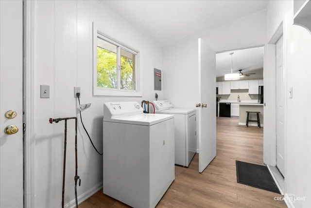 a bathroom with a sink a mirror and shower
