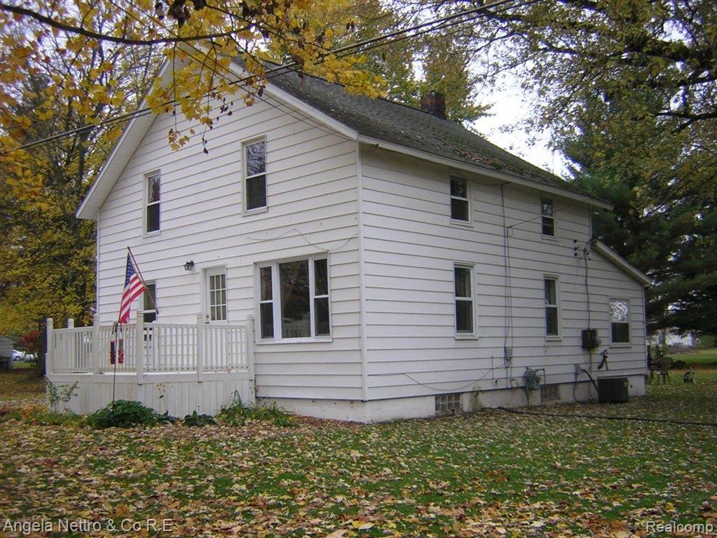 14299 Tuttle Hill Road Milan, MI 48160 - Photo 3 of 21 HOME SIDE VIEW