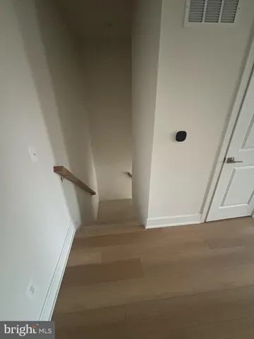 a view of an empty walk in closet