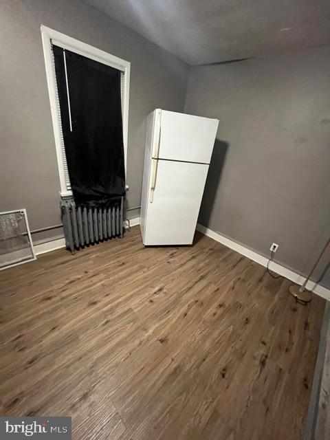1402 1402-upstairs Collings Road Camden, NJ 08104 - Photo 6 of 9 a view of a room with wooden floor and cabinet
