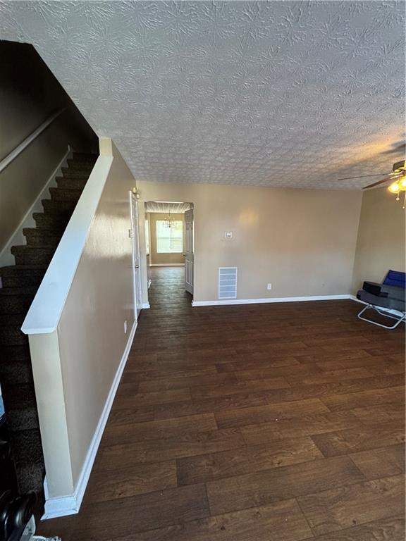 5869 Strathmoor Manor Circle Lithonia, GA 30058 - Photo 13 of 13 a view of a hallway with wooden floor