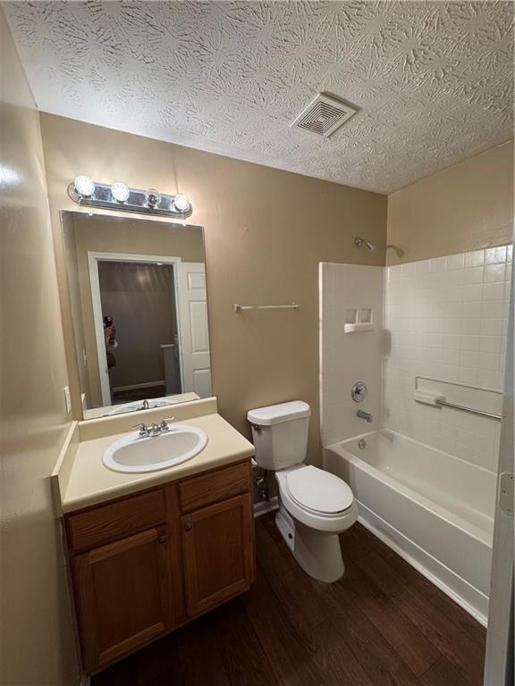 5869 Strathmoor Manor Circle Lithonia, GA 30058 - Photo 7 of 13 a bathroom with a toilet sink and mirror