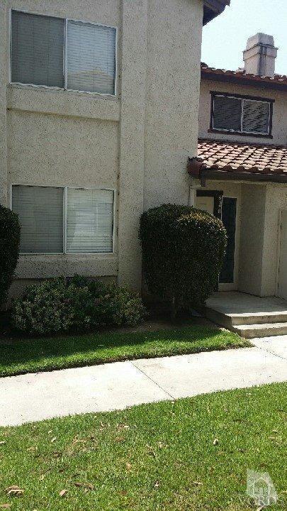420 Johnson Road Oxnard, CA 93033 - Photo 1 of 9 a view of a house with a yard