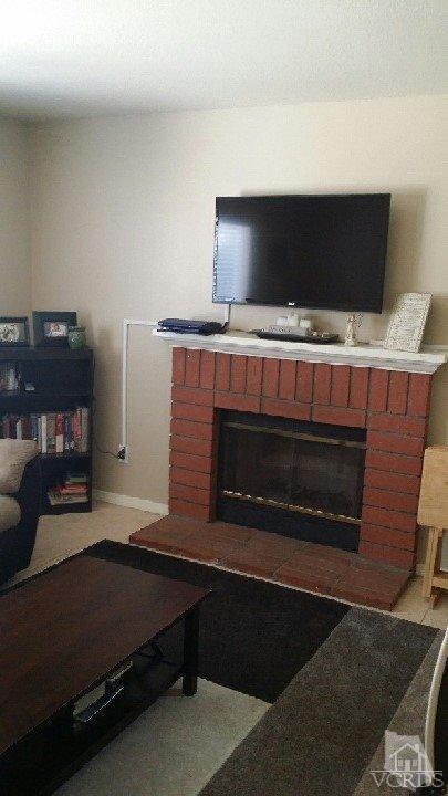420 Johnson Road Oxnard, CA 93033 - Photo 4 of 9 a living room with furniture and a fireplace