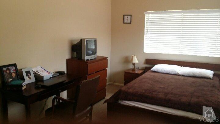 420 Johnson Road Oxnard, CA 93033 - Photo 6 of 9 a bedroom with a bed and a window