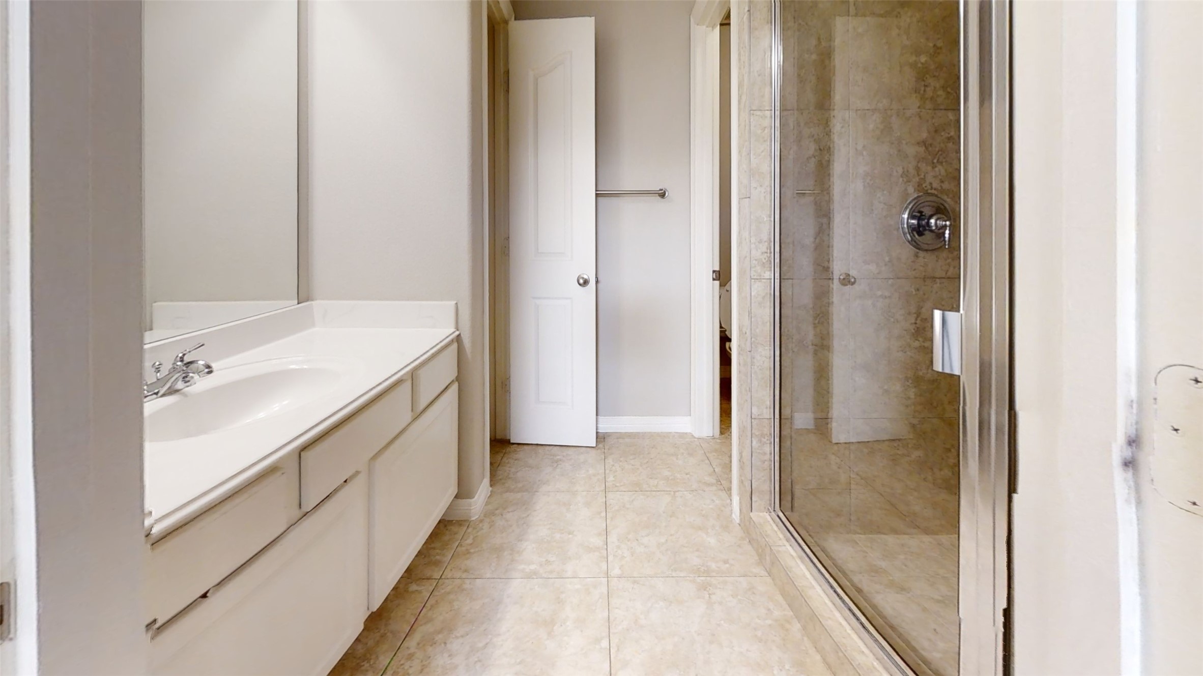9224 Rodney Ray Boulevard, Unit 18 Houston, TX 77040 - Photo 2 of 27 a bathroom with a tub sink vanity and a mirror