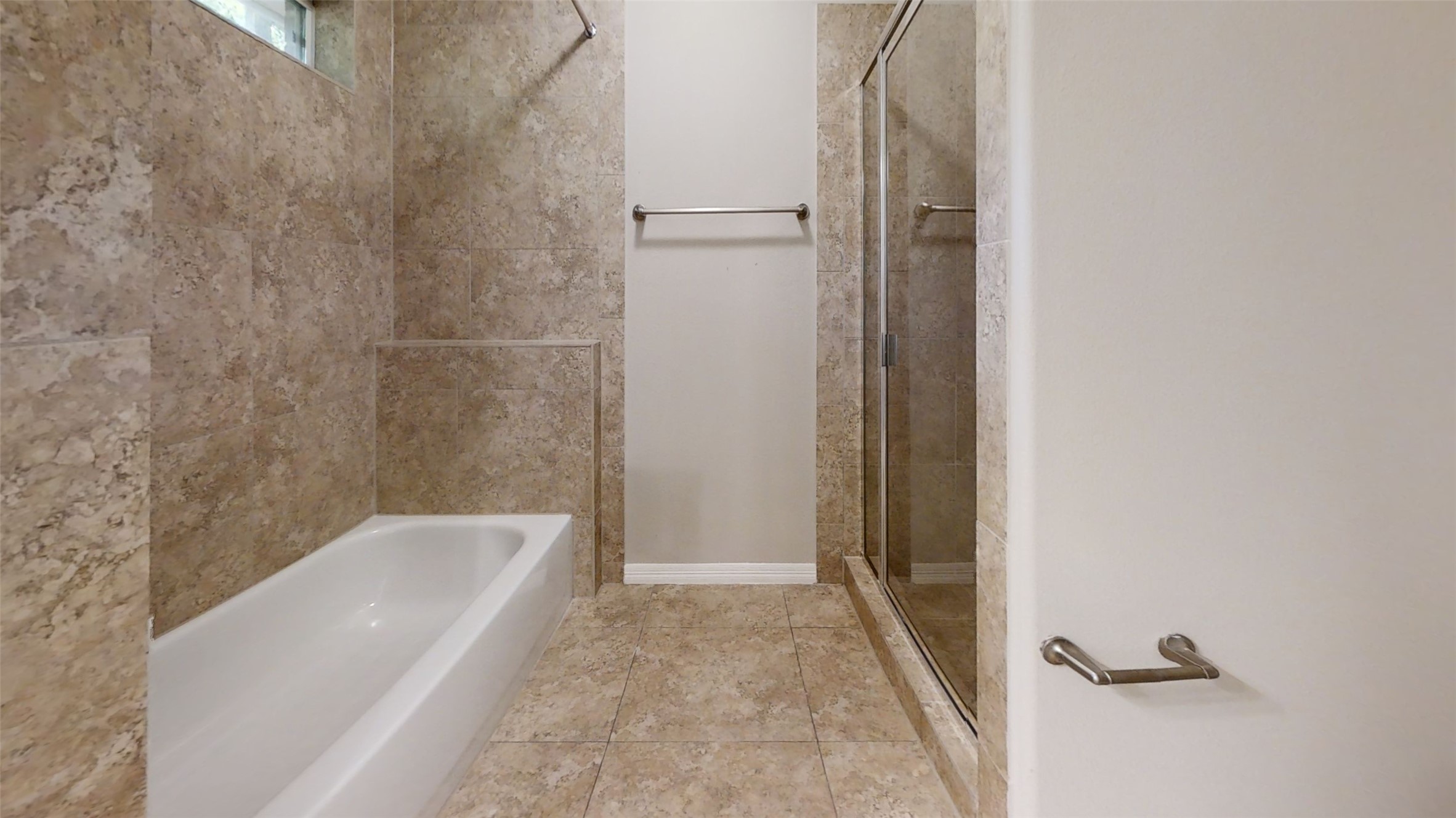 9224 Rodney Ray Boulevard, Unit 18 Houston, TX 77040 - Photo 3 of 27 a bathroom with a tub and shower