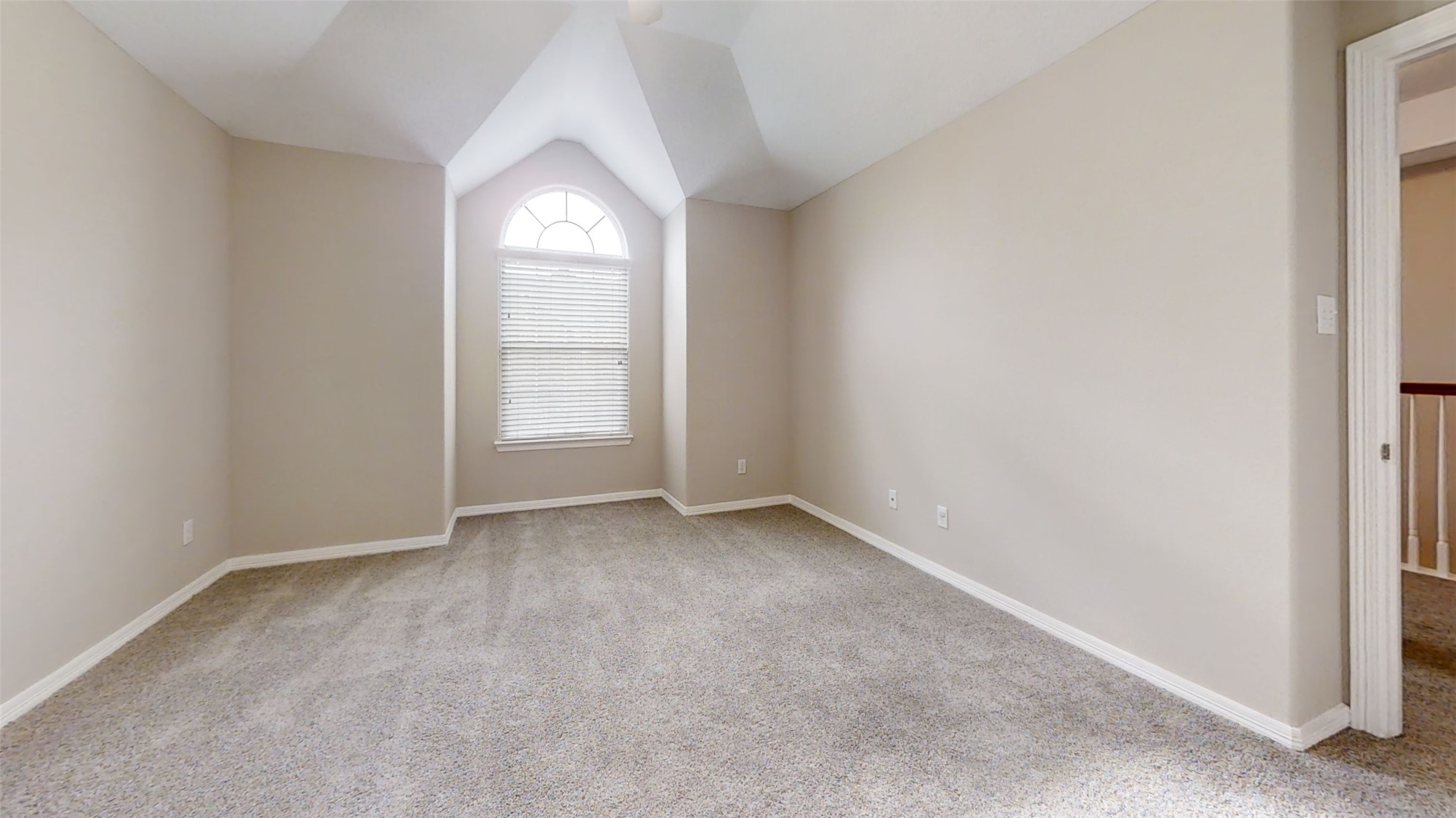 9224 Rodney Ray Boulevard, Unit 18 Houston, TX 77040 - Photo 6 of 27 a view of an empty room with a window