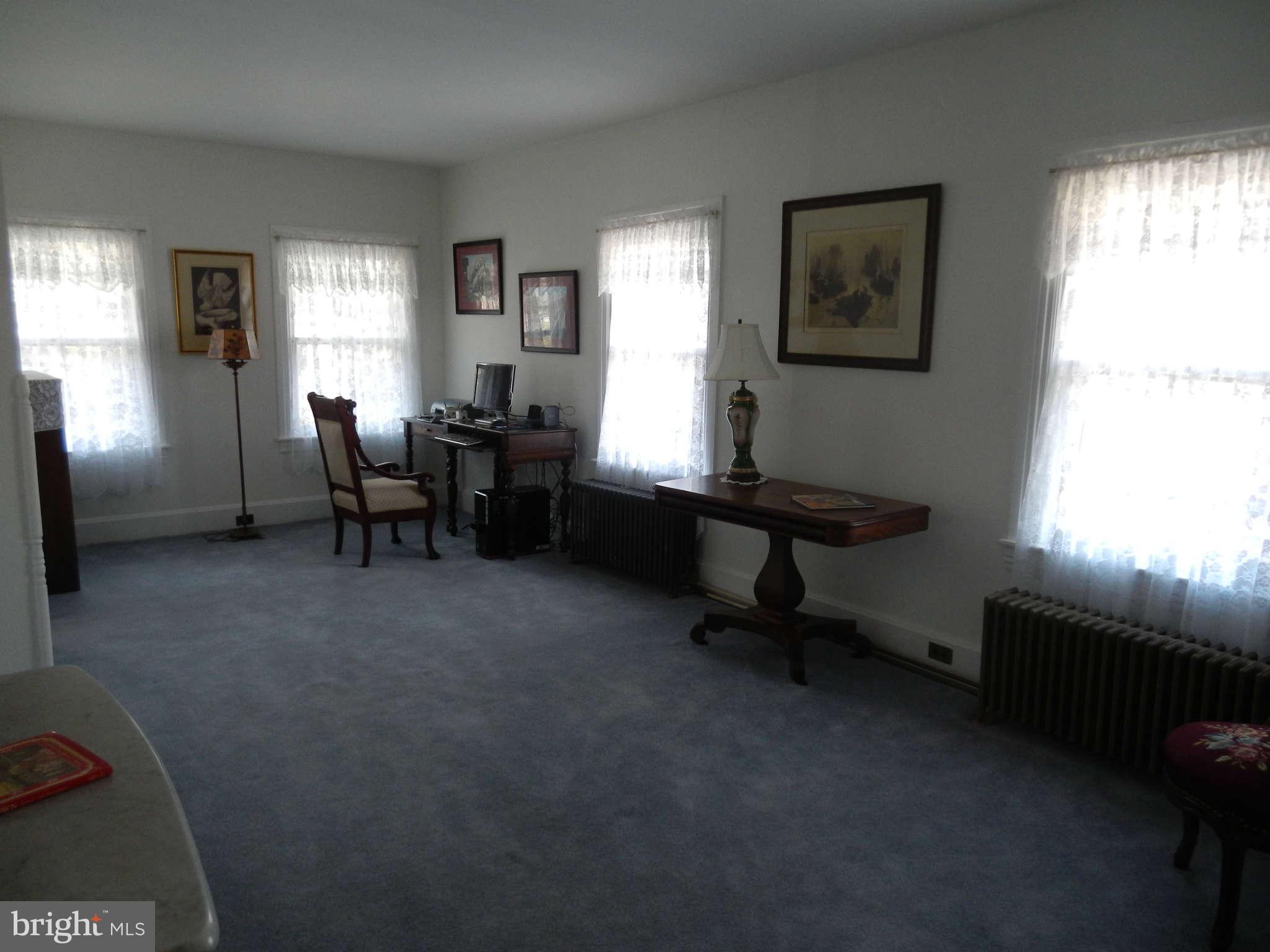 5815 Rowland Hill Road Cascade, MD 21719 - Photo 12 of 30 a living room with furniture and a window