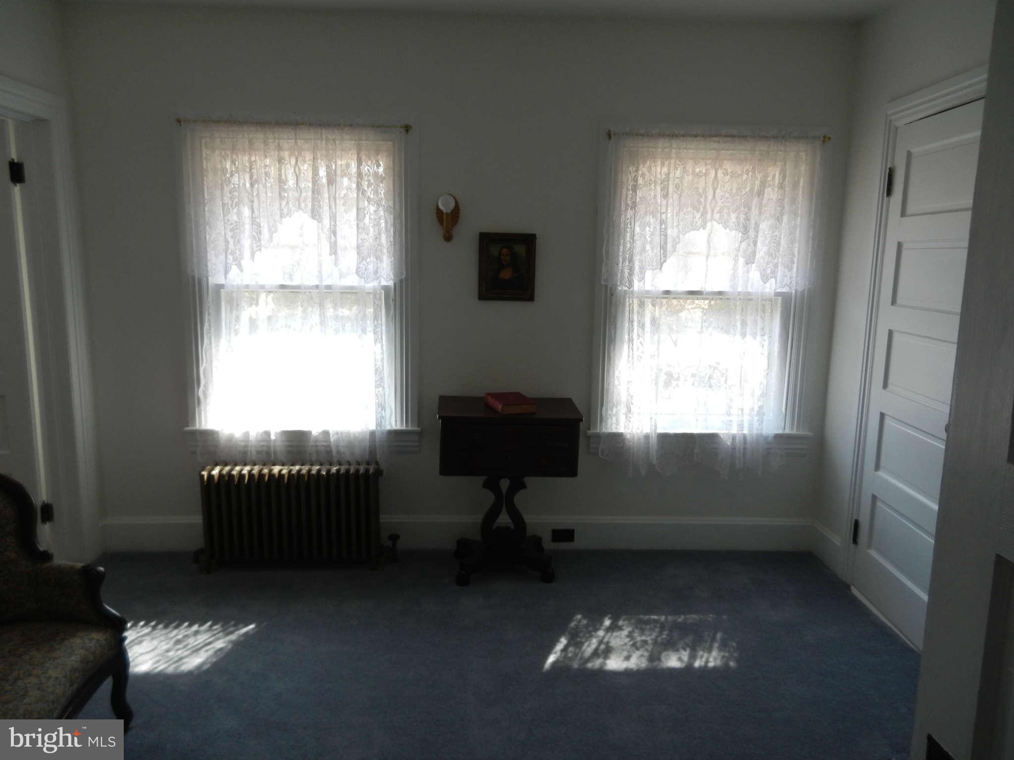 5815 Rowland Hill Road Cascade, MD 21719 - Photo 16 of 30 a living room with furniture and a window