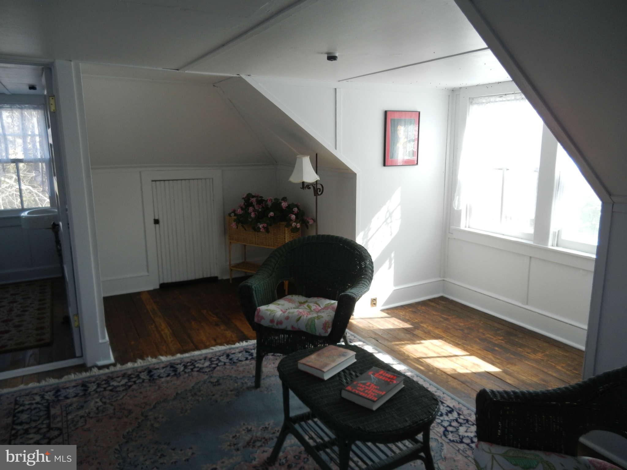 5815 Rowland Hill Road Cascade, MD 21719 - Photo 19 of 30 a living room with furniture and a window