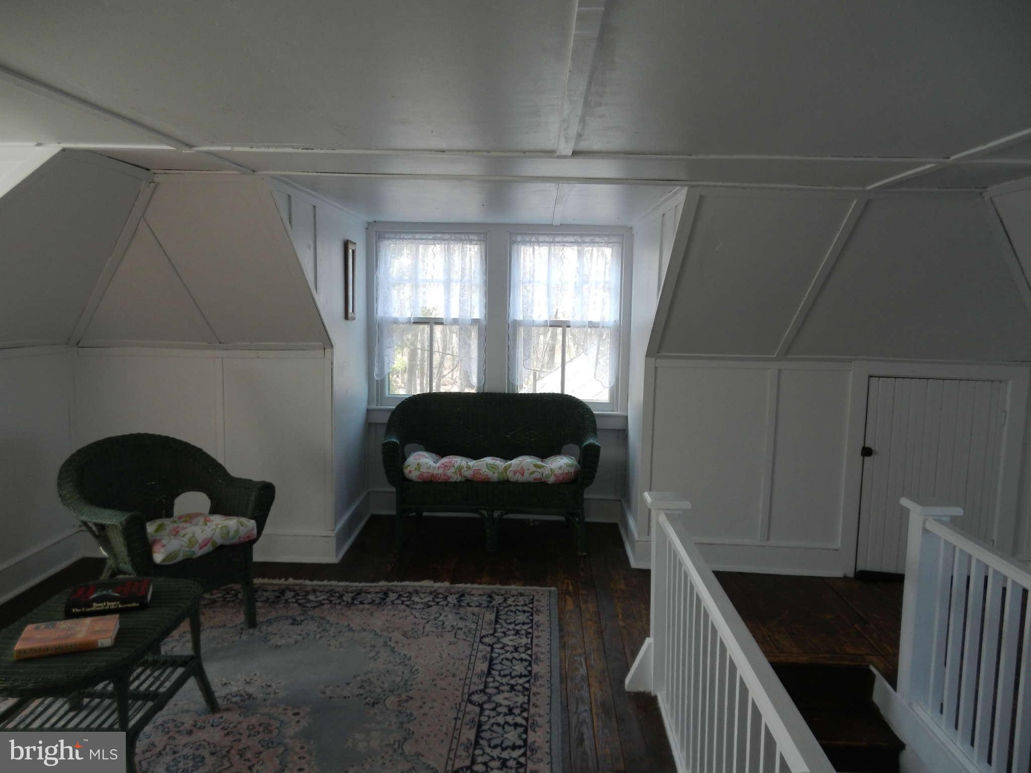 5815 Rowland Hill Road Cascade, MD 21719 - Photo 21 of 30 a living room with furniture and a window