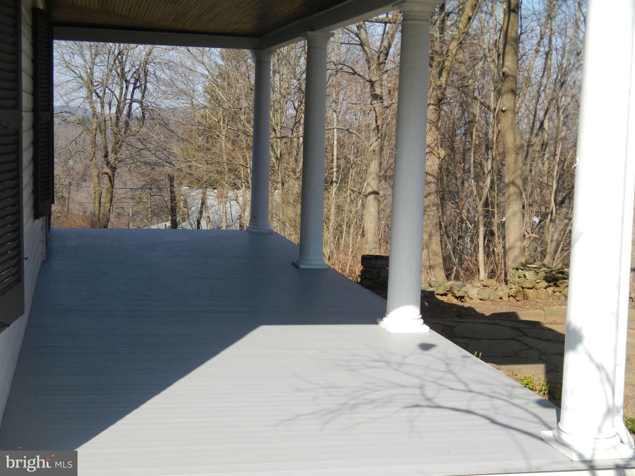 5815 Rowland Hill Road Cascade, MD 21719 - Photo 22 of 30 a bedroom with a bed and a window