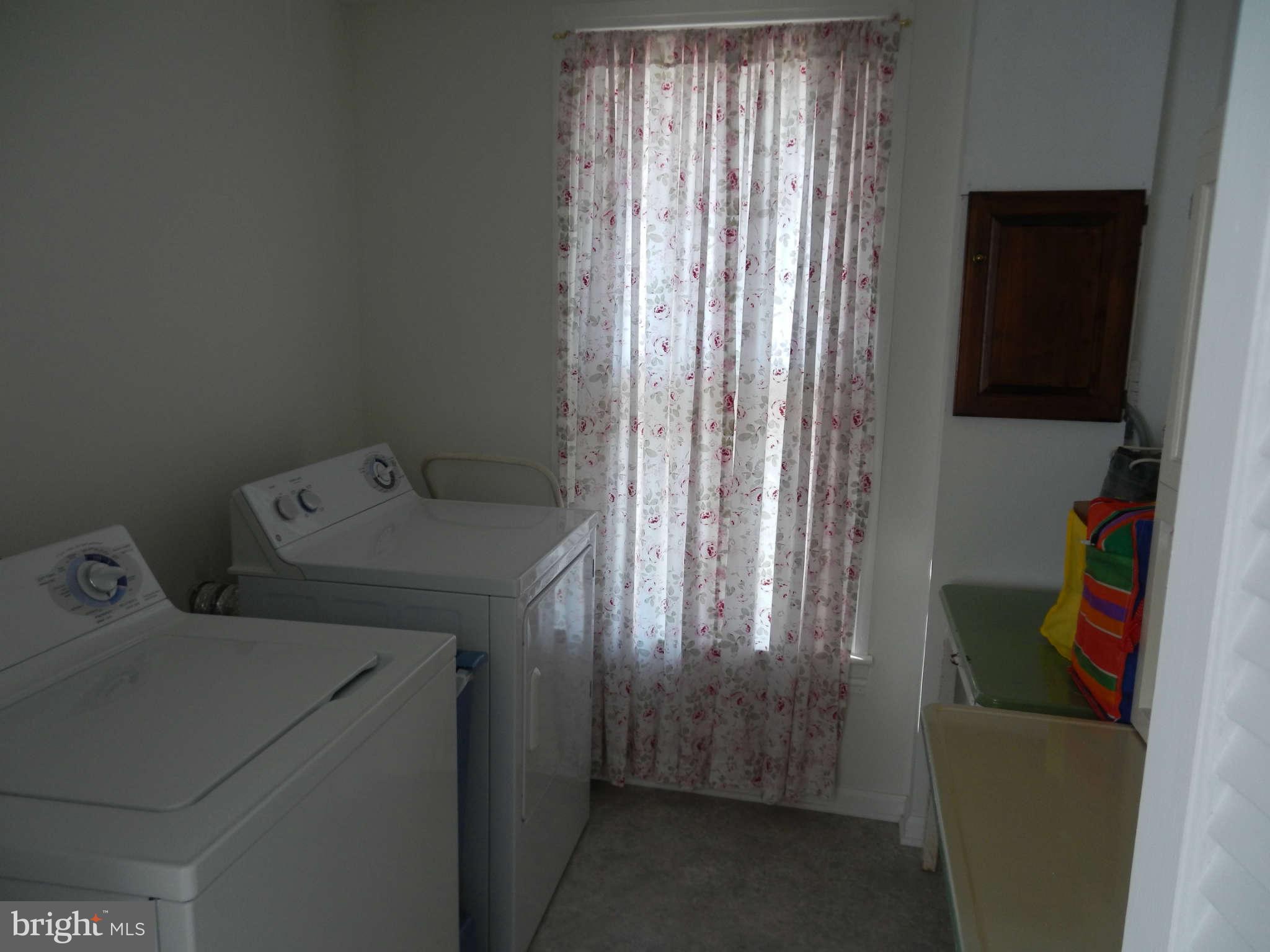 5815 Rowland Hill Road Cascade, MD 21719 - Photo 26 of 30 a utility room with dryer and washer