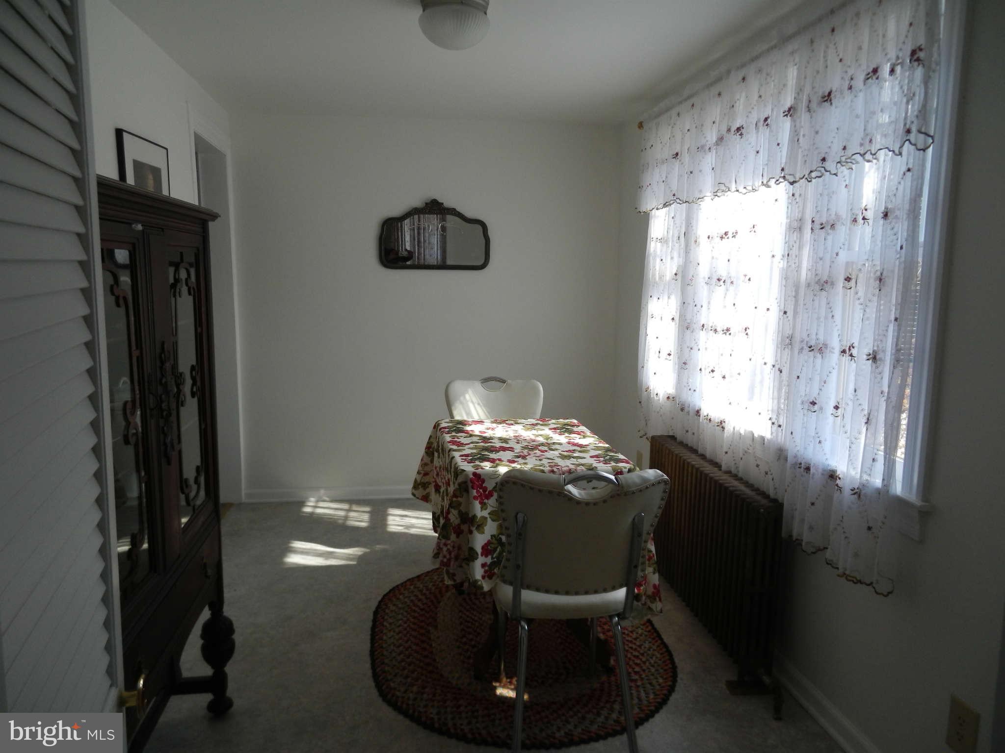 5815 Rowland Hill Road Cascade, MD 21719 - Photo 27 of 30 a dining room with furniture and window