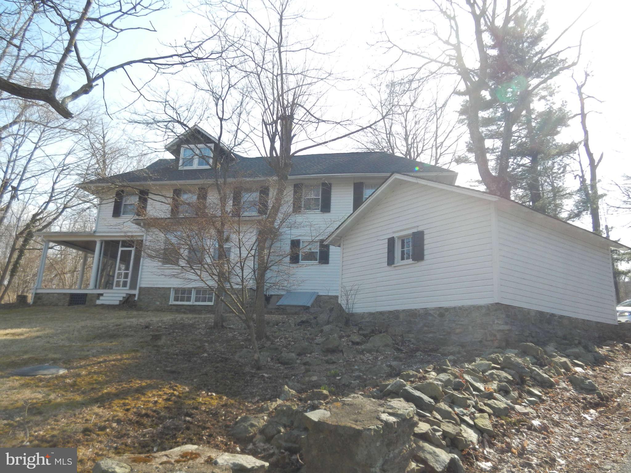 5815 Rowland Hill Road Cascade, MD 21719 - Photo 29 of 30 a view of a house with a yard