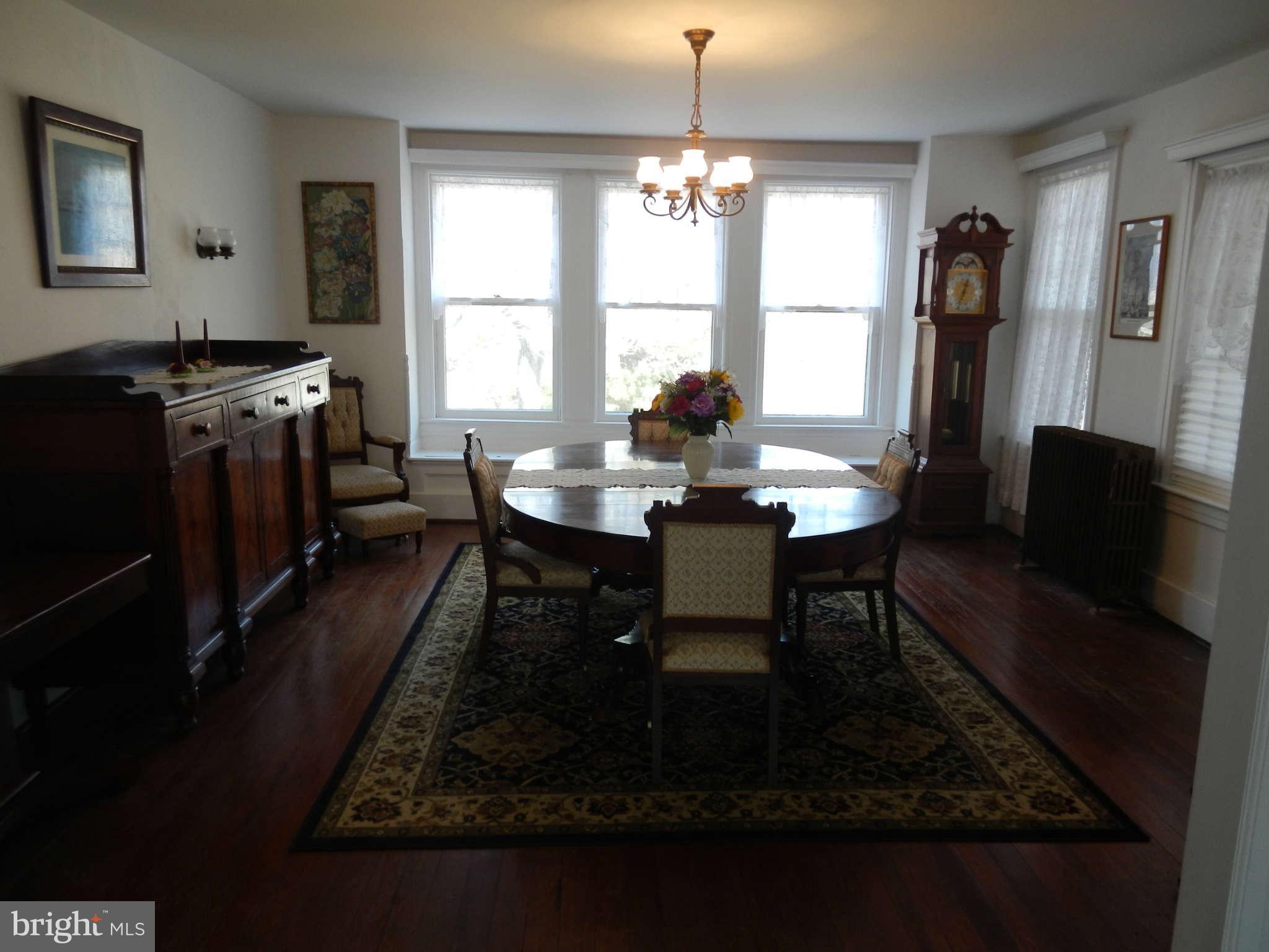 5815 Rowland Hill Road Cascade, MD 21719 - Photo 8 of 30 a dining room with furniture and window