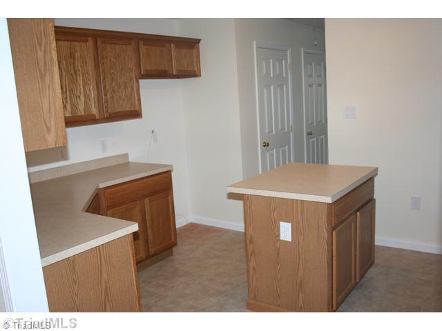 1911 Doe Run Road Mebane, NC 27302 - Photo 6 of 16 Kitchen. 2nd View of Kitchen w/Island