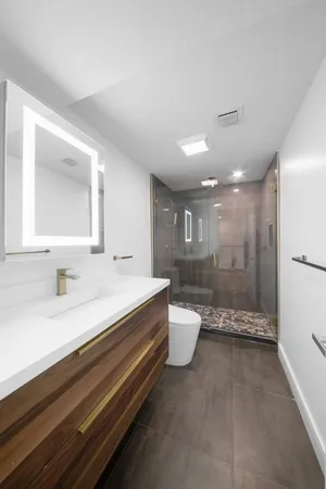 a bathroom with a sink a toilet and a bathtub