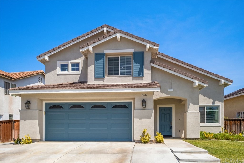 5223 Holstein Street Riverside, CA 92509 - Photo 1 of 1 a front view of a house with a yard