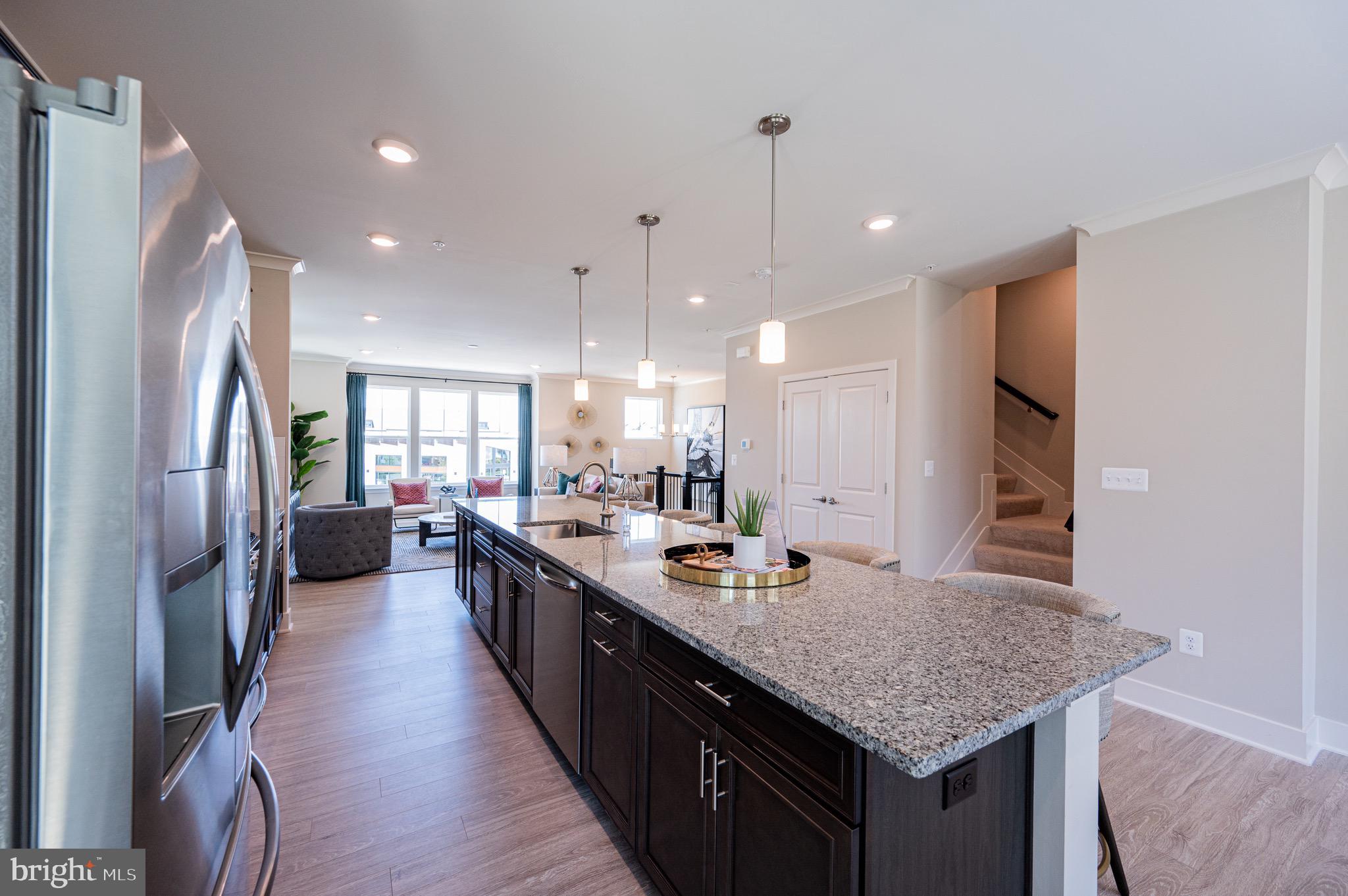 7209 Paper Way Glen Burnie, MD 21060 - Photo 19 of 40 a kitchen with sink stove and refrigerator