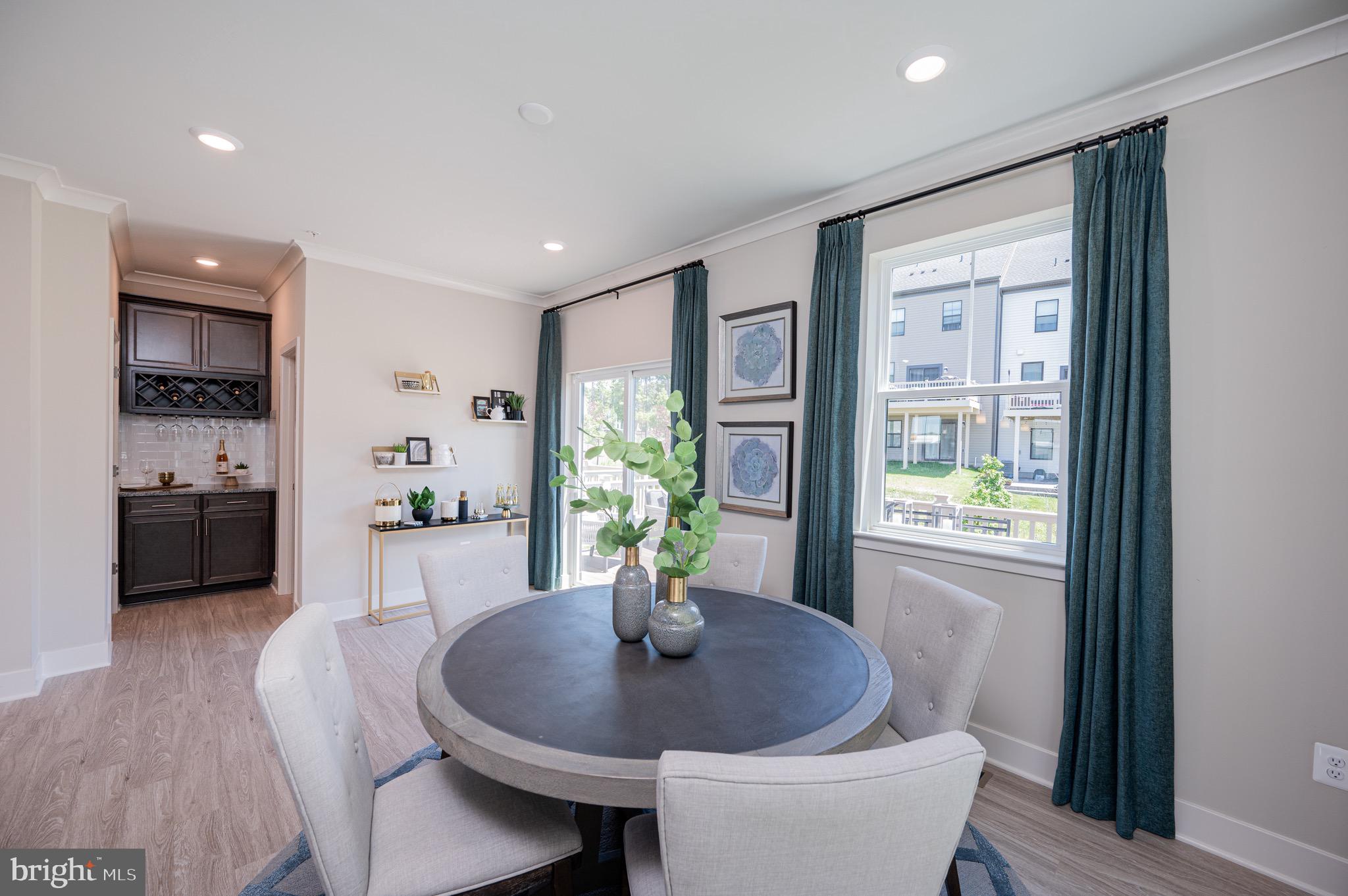 7209 Paper Way Glen Burnie, MD 21060 - Photo 23 of 40 a living room with furniture and a potted plant