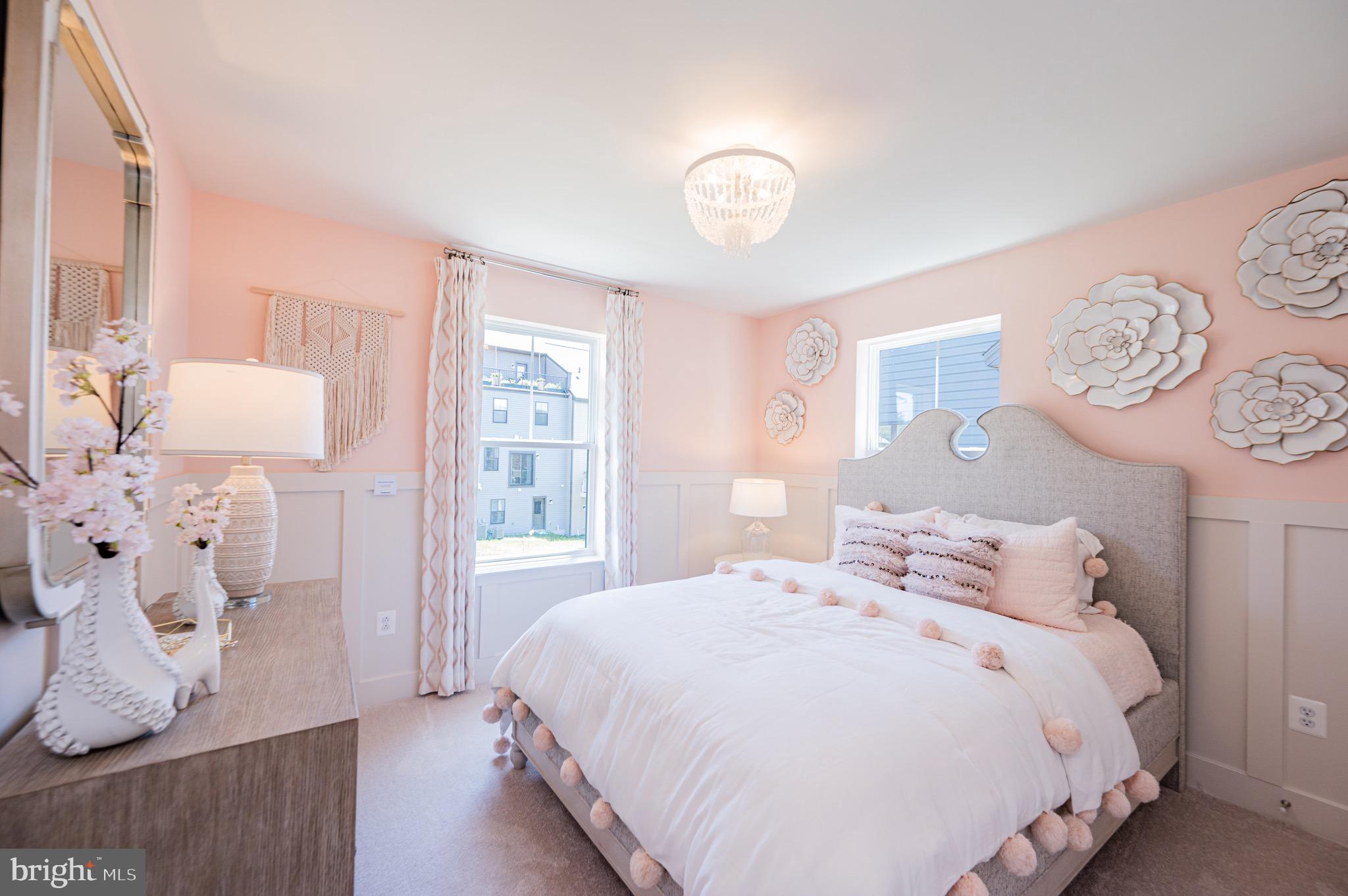 7209 Paper Way Glen Burnie, MD 21060 - Photo 27 of 40 a bedroom with a bed and a window